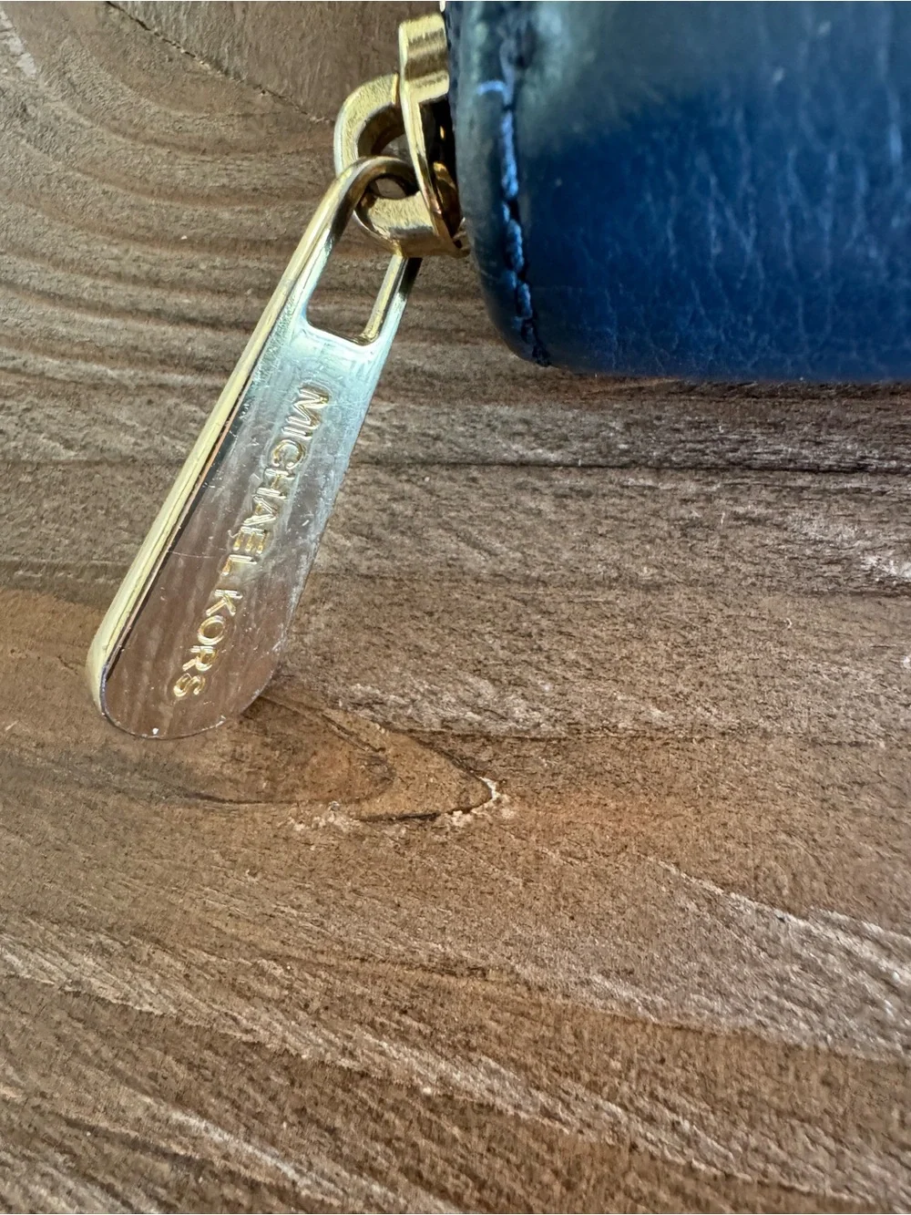 Michael Kors Deep Blue Pebbled Leather Zip Around Wallet with Gold Plate